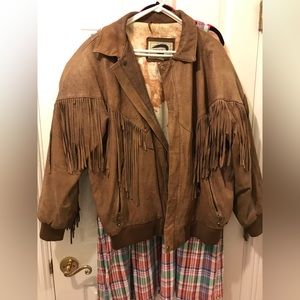 Vintage leather jacket with fringe.